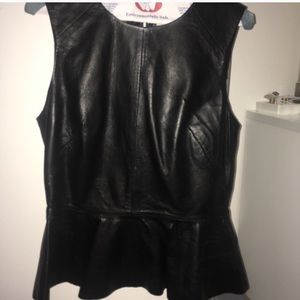 Women’s leather shirt with zippered back.